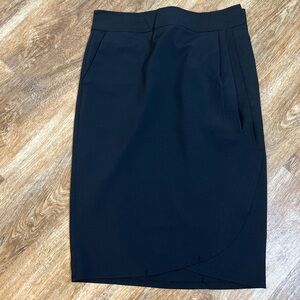 RipSkirt Black Size: Small (4-6), Knee Length Wrap Skirt Wrinkle free.